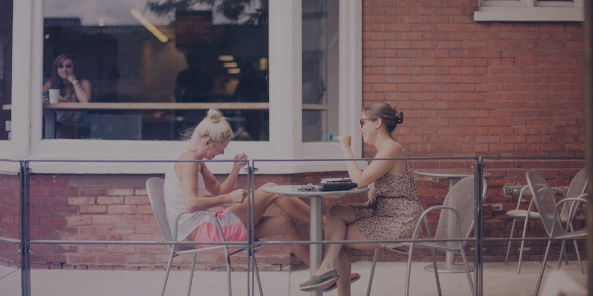 two ladies having coffee