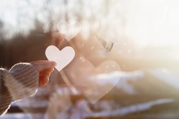 Concept of sending a love message on Valentine Day with hope.